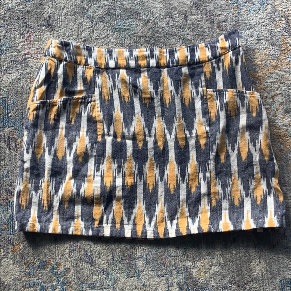 Patterned cotton mini skirt with pockets